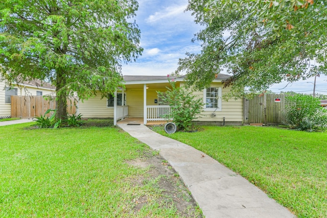 view of front of house with a front lawn