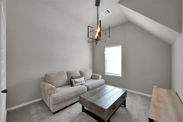 carpeted living room with vaulted ceiling and a notable chandelier