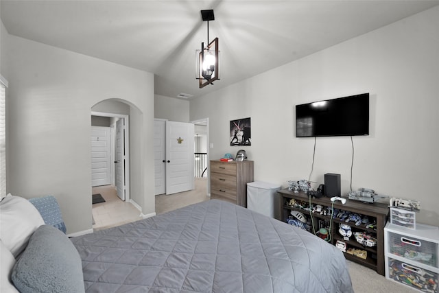 carpeted bedroom featuring connected bathroom