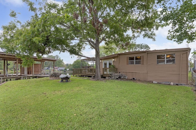 view of yard with a wooden deck