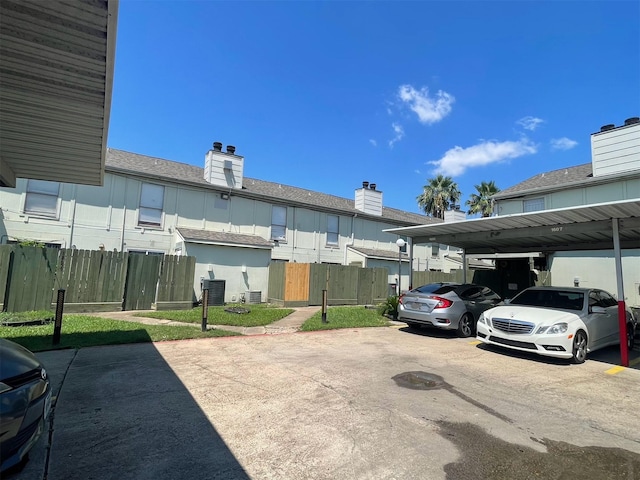 view of car parking featuring a carport