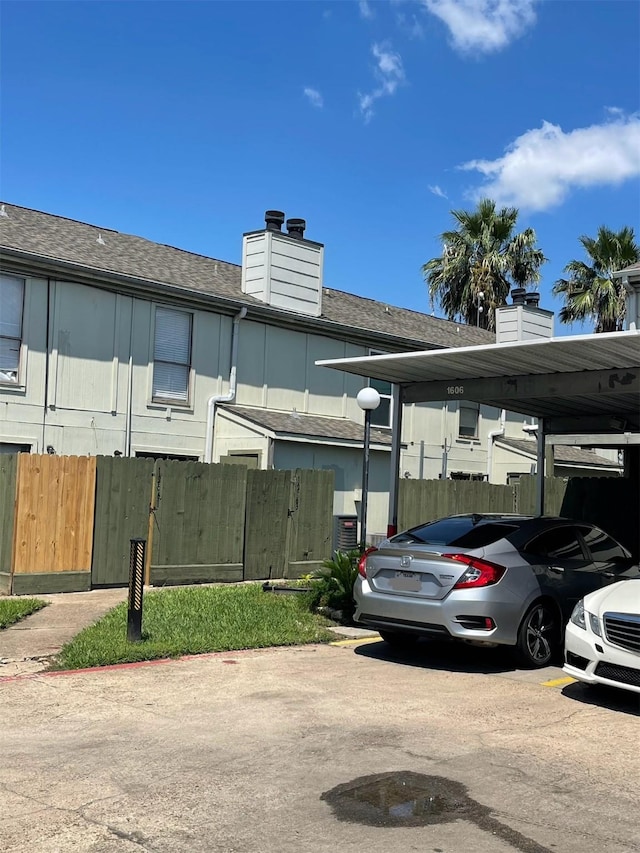 view of parking with a carport