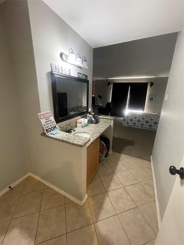 bathroom featuring vanity and tile patterned floors