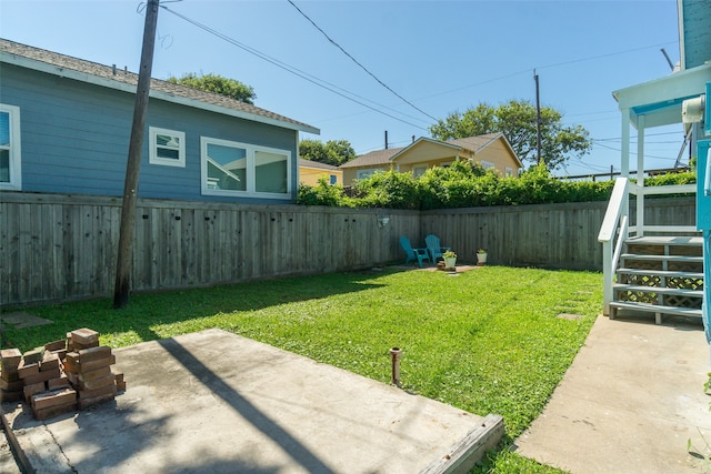 view of yard with a patio area