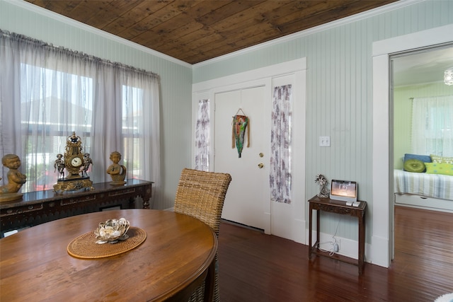 dining space with wood ceiling, ornamental molding, and dark hardwood / wood-style floors