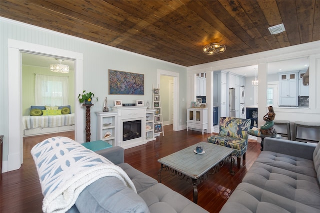 living room featuring wood ceiling, crown molding, a chandelier, and dark hardwood / wood-style floors