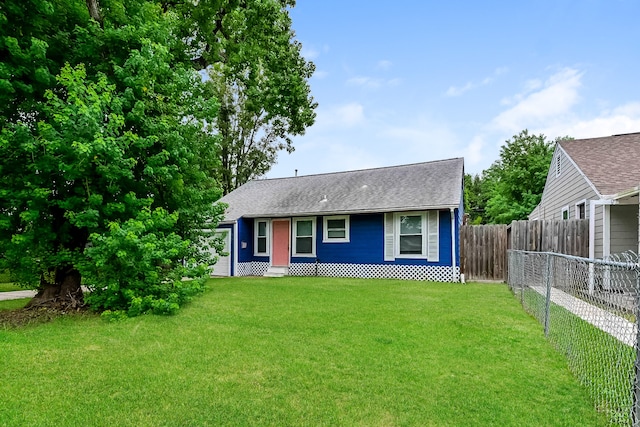 single story home featuring a front yard