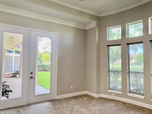 entryway featuring crown molding, carpet, and french doors