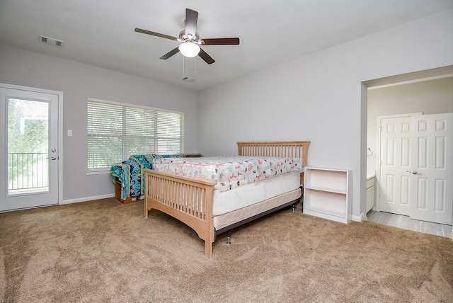 bedroom featuring access to exterior, ceiling fan, and light colored carpet