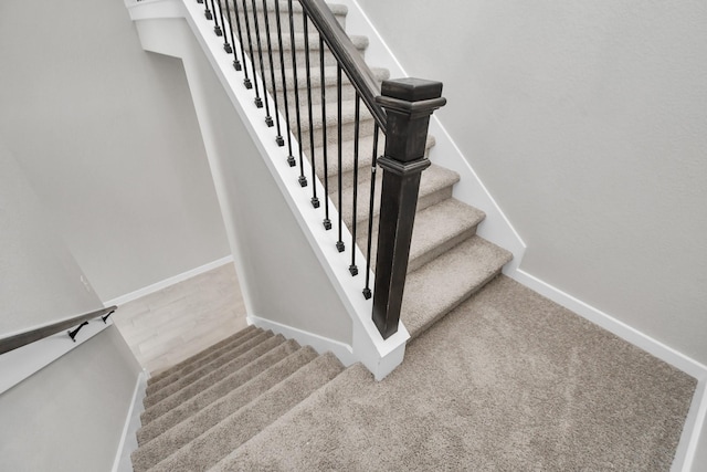 15327 Statice Trl, Houston, TX 77044 - stairway featuring baseboards