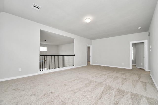 15327 Statice Trl, Houston, TX 77044 - spare room featuring carpet flooring and baseboards