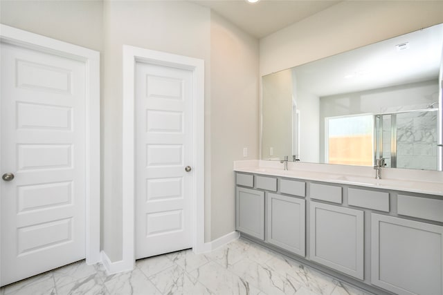 bathroom with vanity and walk in shower