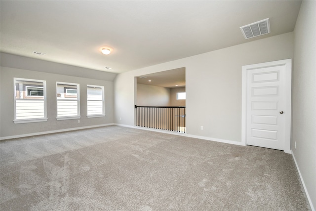 unfurnished room with carpet floors