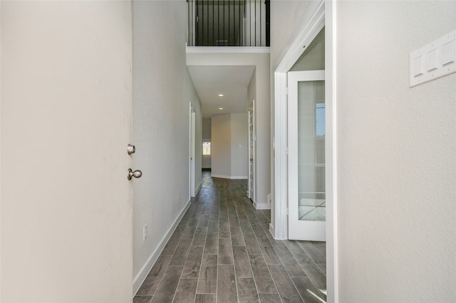 hallway featuring dark hardwood / wood-style floors