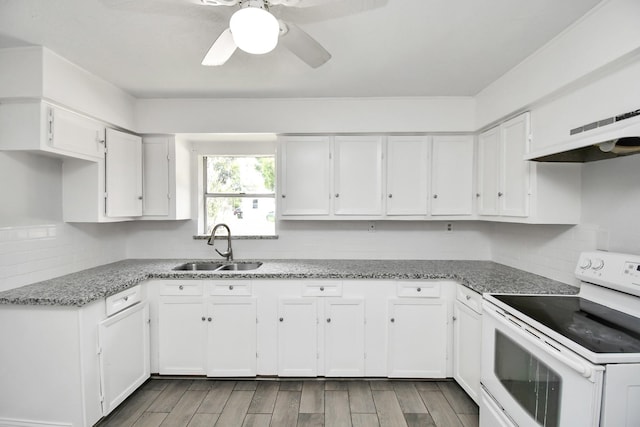 kitchen featuring ceiling fan, wood finish floors, a sink, white cabinets, and white range with electric cooktop