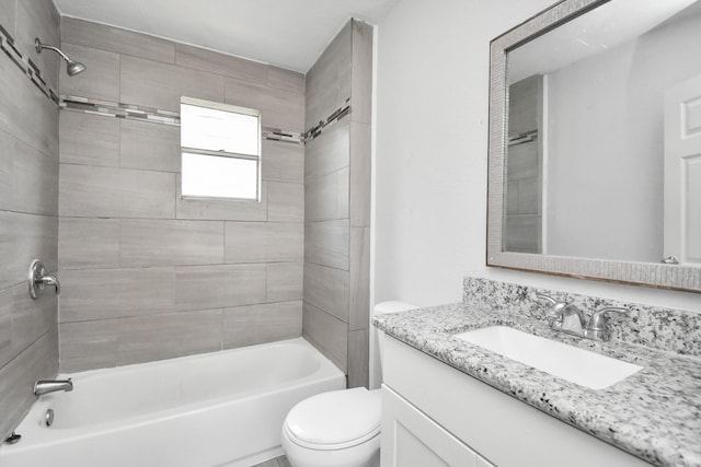 full bathroom featuring  shower combination, vanity, and toilet