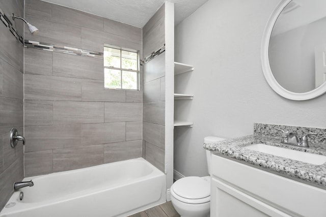 full bathroom with toilet, vanity, and shower / bathtub combination