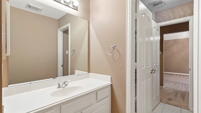 bathroom featuring vanity and tile patterned floors