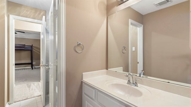 bathroom featuring tile patterned floors and vanity