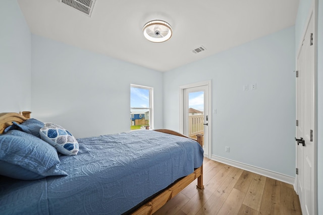 bedroom featuring hardwood / wood-style floors