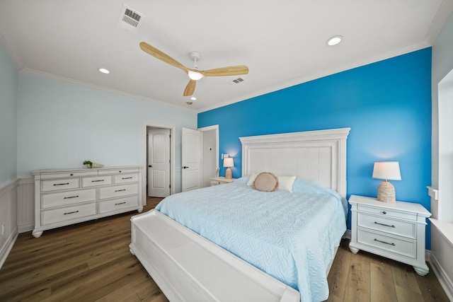 bedroom with ornamental molding, dark wood-type flooring, and ceiling fan