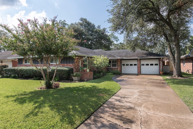 ranch-style home with a garage and a front lawn