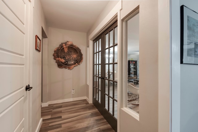 hallway with dark wood-type flooring