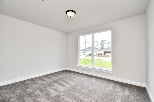 spare room with carpet flooring