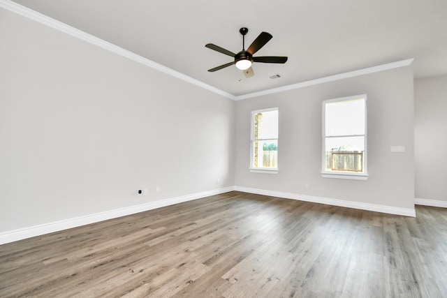 unfurnished room featuring ornamental molding, hardwood / wood-style floors, and ceiling fan