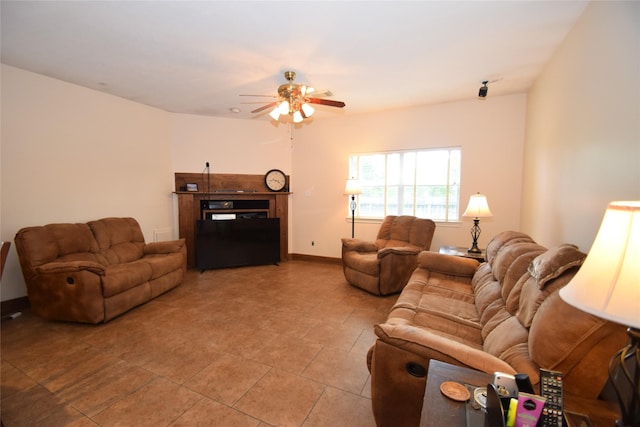 living room featuring ceiling fan