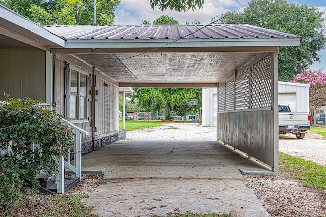 view of car parking featuring a carport