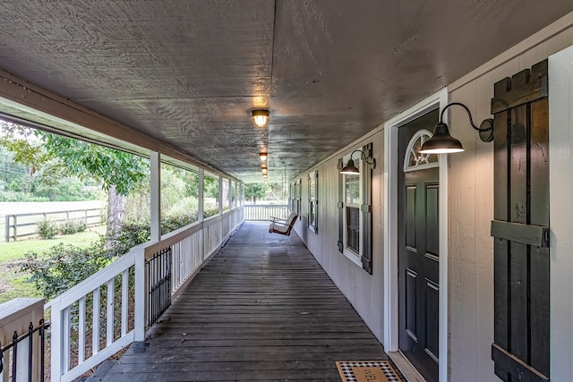 wooden terrace with covered porch