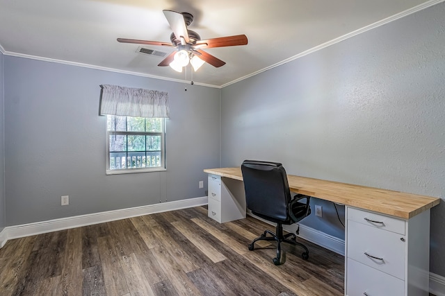 office space with crown molding, ceiling fan, and dark hardwood / wood-style floors