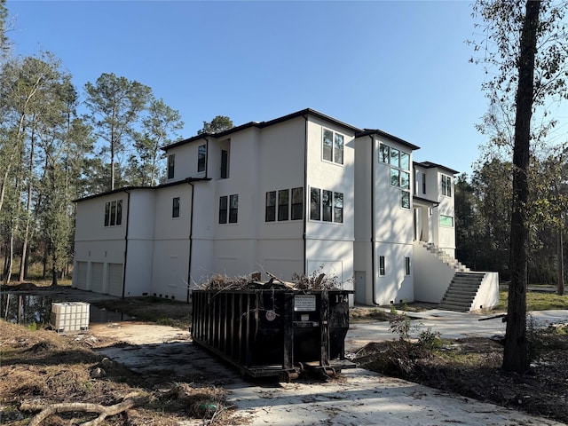 view of property exterior with a garage