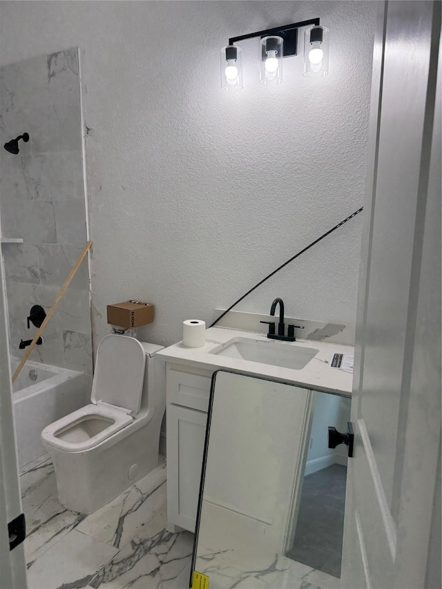 full bathroom featuring vanity, toilet, and shower / tub combination