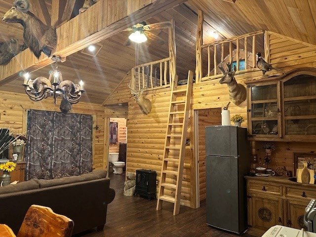 living room with wood ceiling, dark hardwood / wood-style floors, ceiling fan with notable chandelier, and high vaulted ceiling