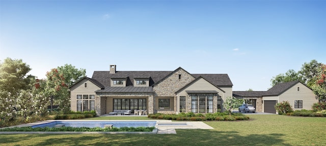 view of front of house featuring a front yard and a garage