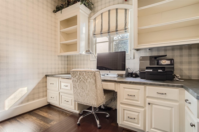 25002 Falling Water Estates Ln, Katy, TX 77494 - home office featuring wallpapered walls, built in desk, and dark wood-type flooring