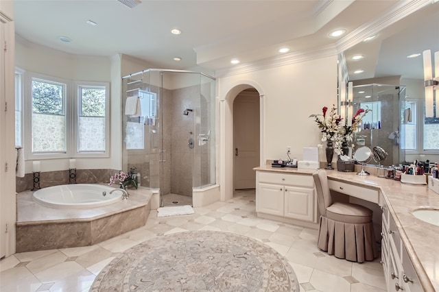 bathroom with ornamental molding, vanity, separate shower and tub, and tile patterned floors