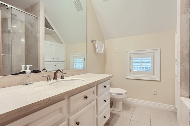 bathroom with a shower with door, tile patterned floors, toilet, lofted ceiling, and vanity