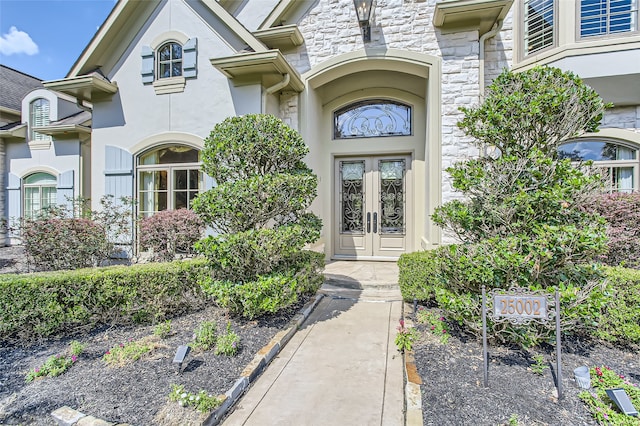 doorway to property with french doors