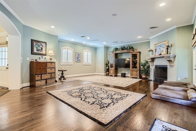 living room featuring crown molding and dark hardwood / wood-style flooring