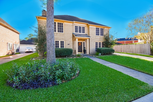 view of front of home featuring a front lawn