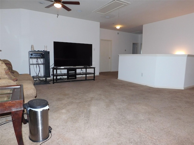 living room with light colored carpet and ceiling fan