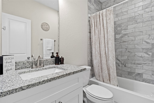 full bathroom featuring shower / bath combo, vanity, and toilet