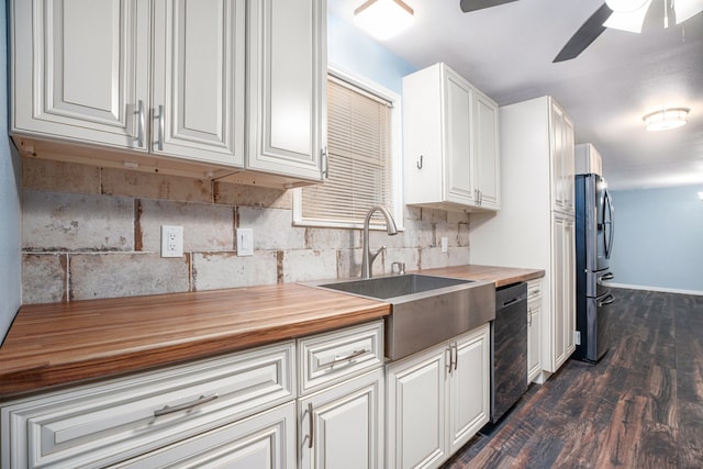 kitchen featuring stainless steel fridge, tasteful backsplash, dishwasher, ceiling fan, and dark wood-type flooring