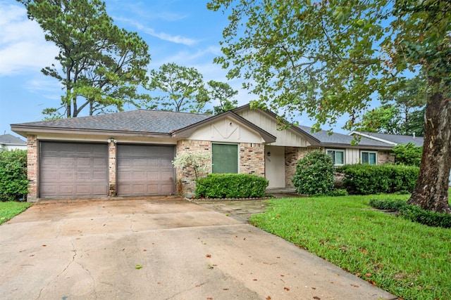 ranch-style home featuring a garage and a front yard