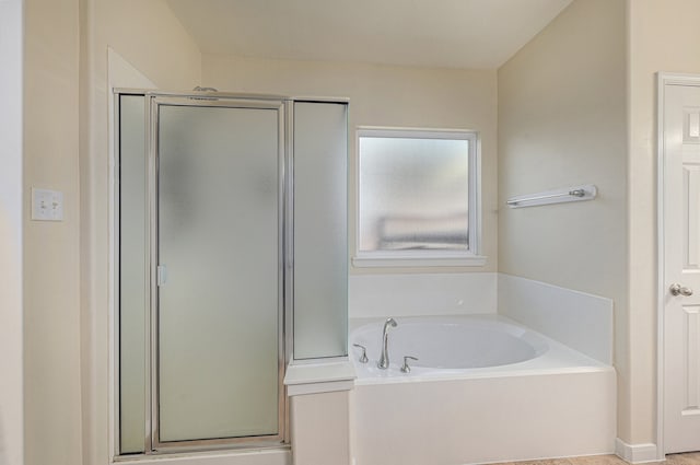 bathroom with separate shower and tub