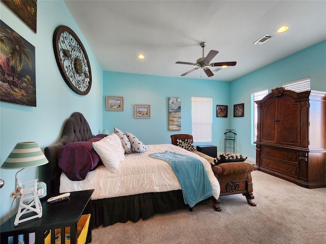 carpeted bedroom featuring ceiling fan