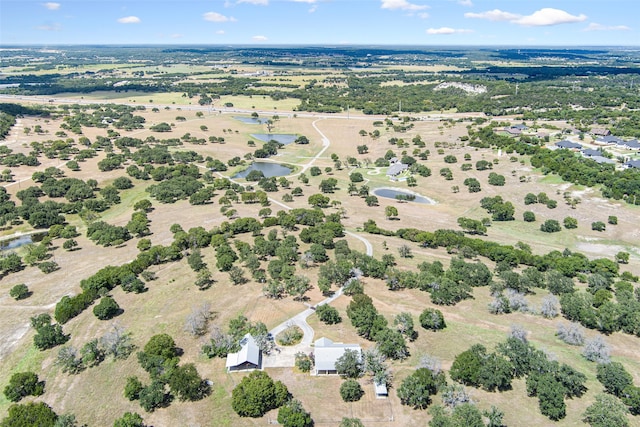 birds eye view of property featuring a rural view